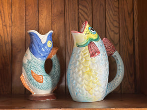 two fish pitchers with colorful scales
