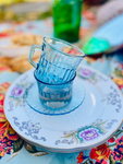 Vintage blue glass teacup and saucer